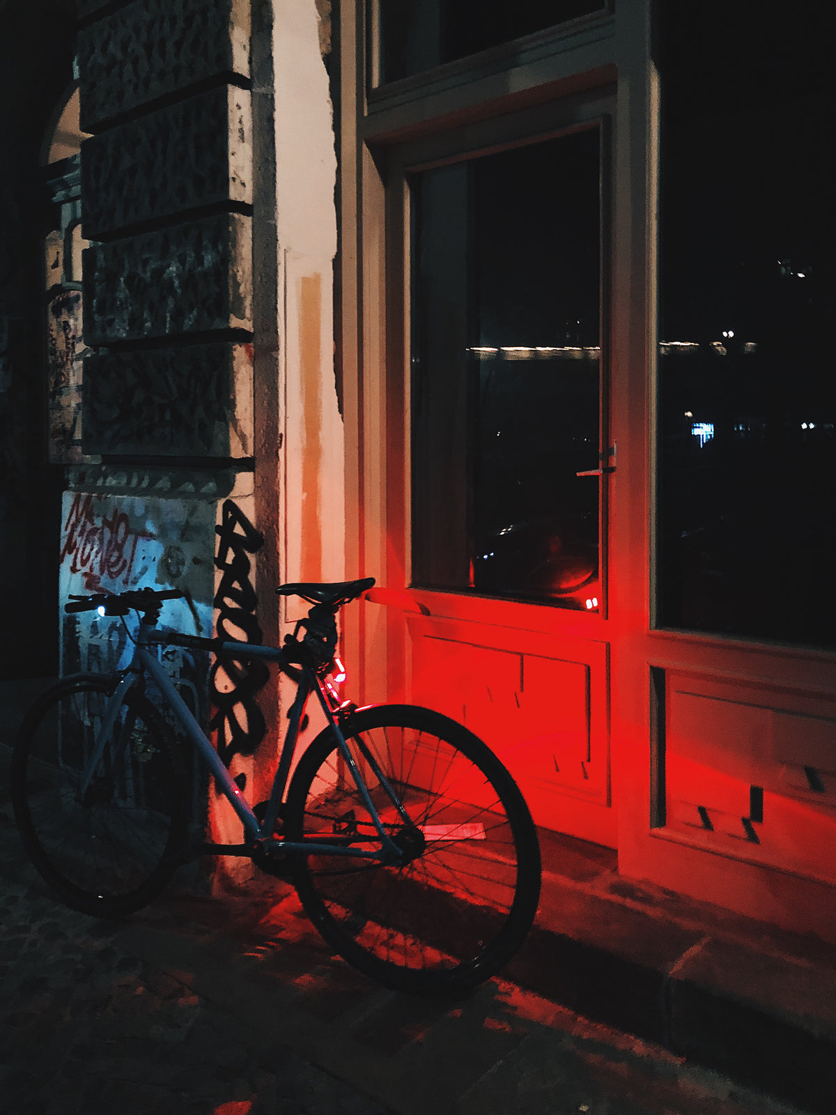 bike leaning against a building