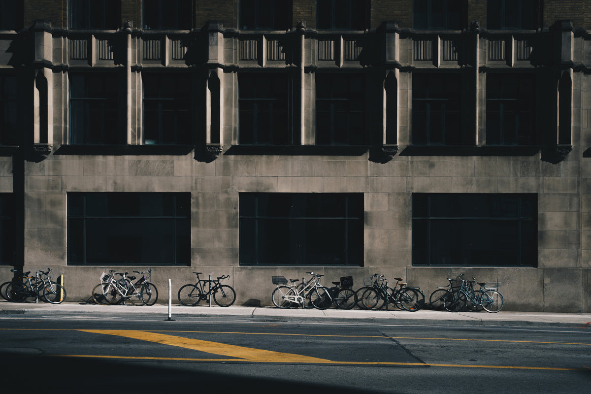 bikes parked near stone building
