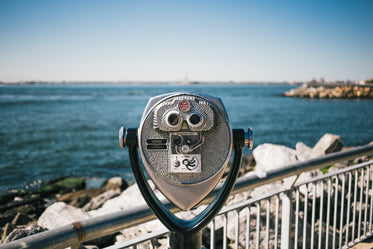 Binoculars Looking At Ocean