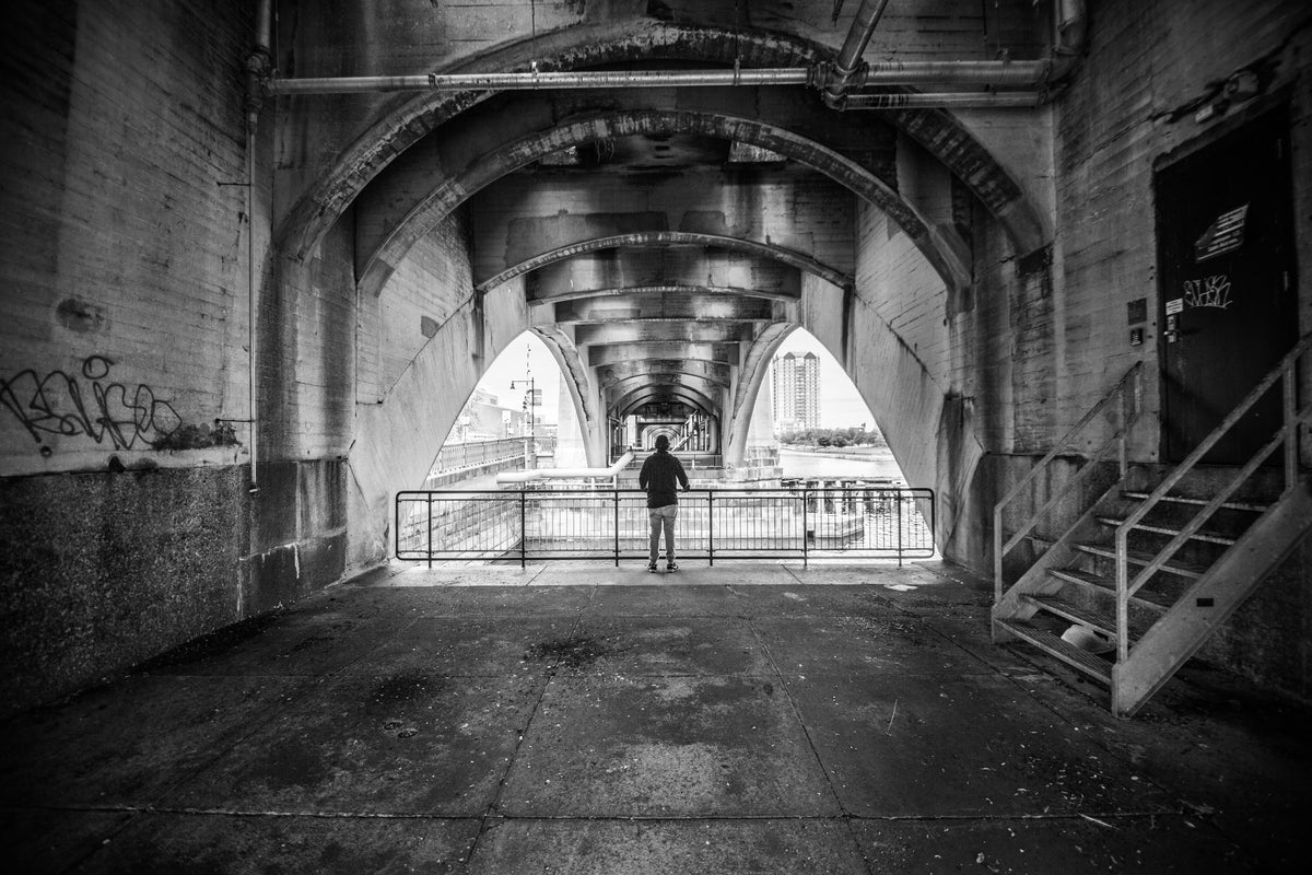 black and white below bridge