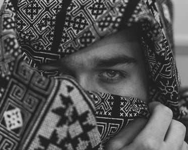 black and white close up image of a persons eyes