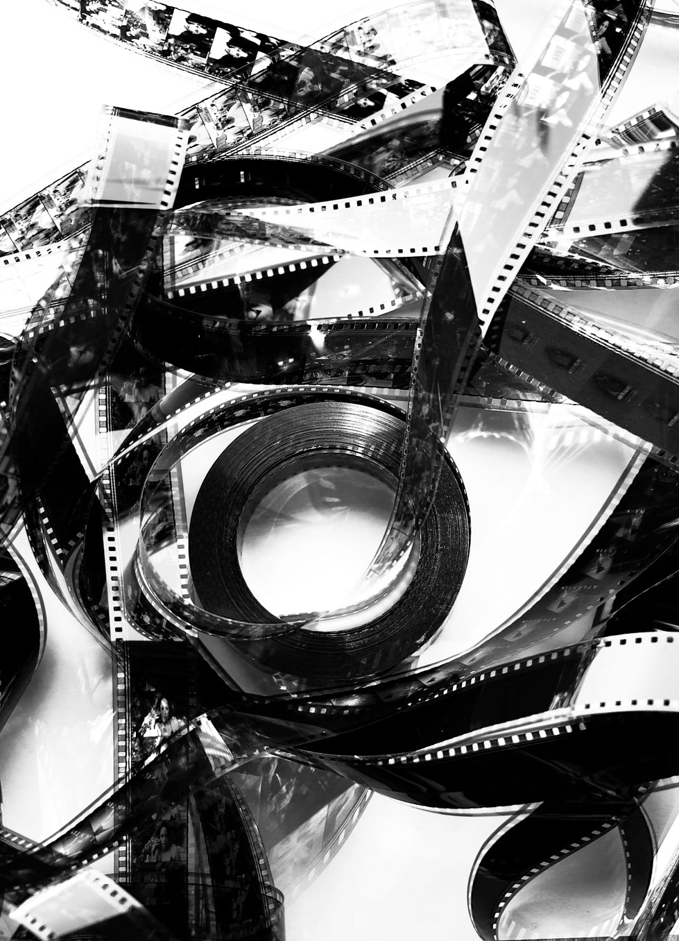 black and white photo of a tangled movie reel