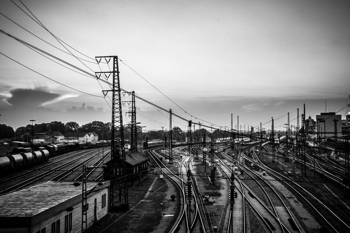 black and white photo of train tracks