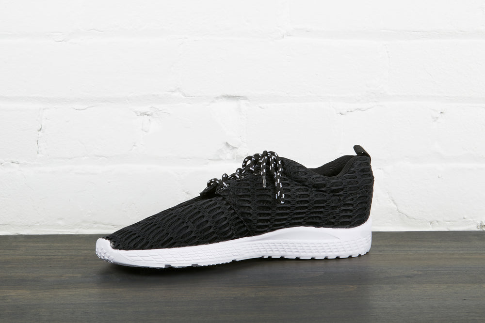 black and white running shoe