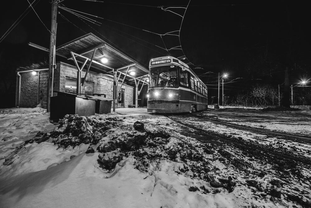 black and white winter street car