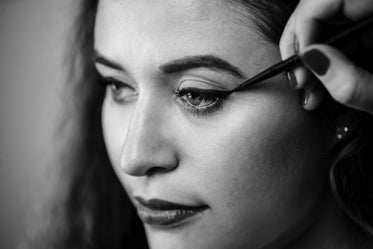 Picture of Black And White Woman Gets Makeup — Free Stock Photo