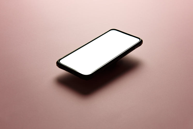black cellphone floats above pink background