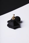 black glass perfume bottle and spritzer