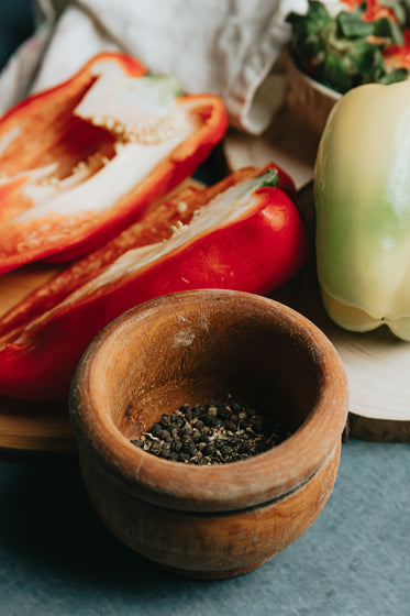 black pepper in a small wooden bowl