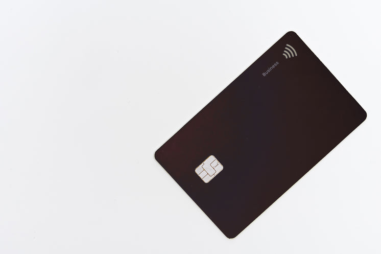 black-plastic-debit-card-on-a-white-tabl