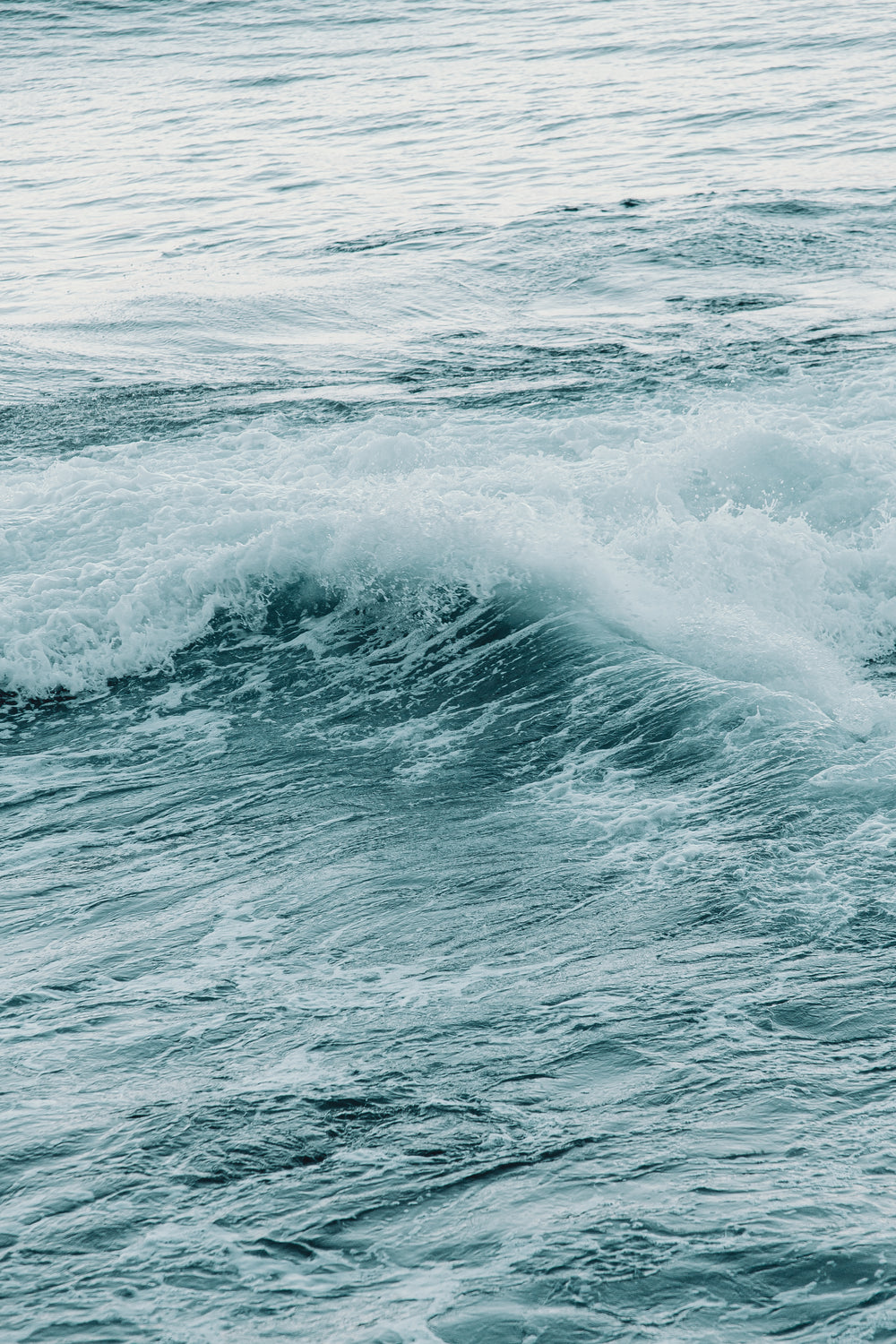 blue and white waves crashing