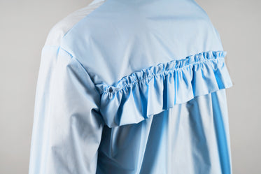 blue blouse ruffle detail