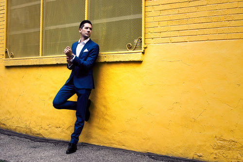 Blue Formal Suit Yellow Wall