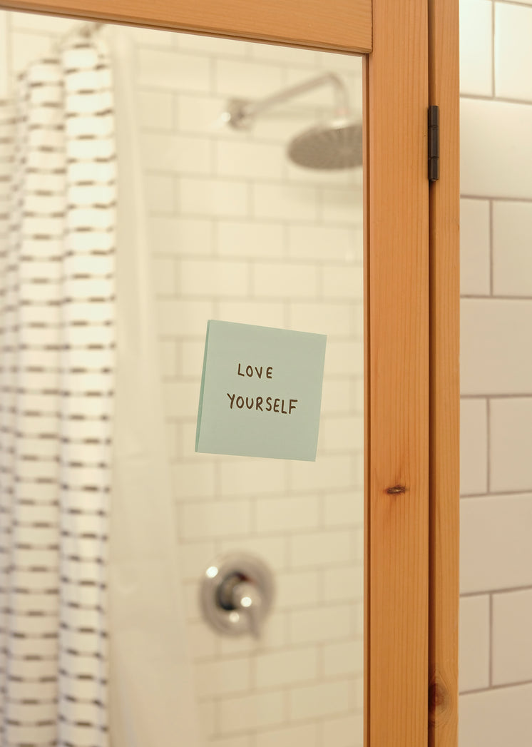blue-note-on-a-bathroom-mirror-reads-lov