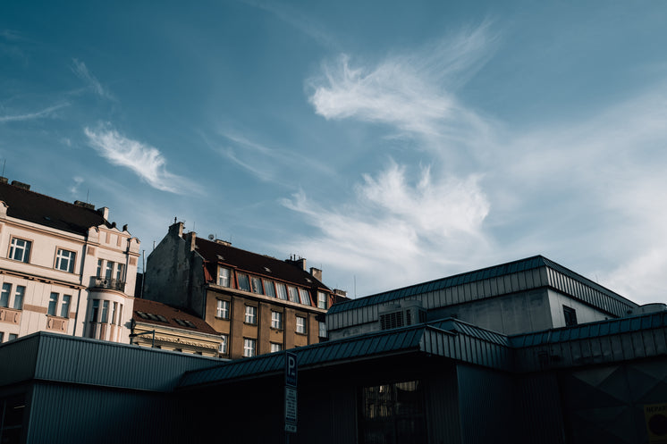 blue-skies-with-wispy-clouds-over-building-rooftops.jpg?width=746&format=pjpg&exif=0&iptc=0