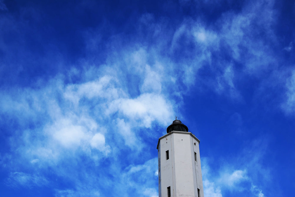 blue sky behind tower top