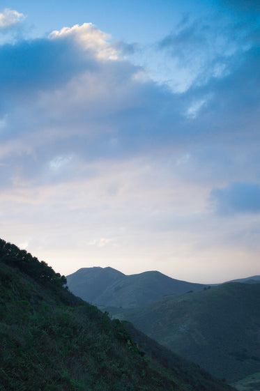 blue sky over hillside