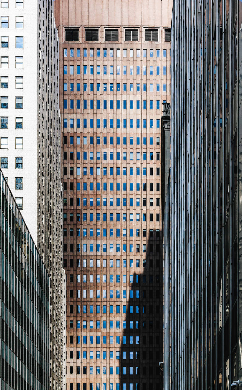 blue windows on multi storey building