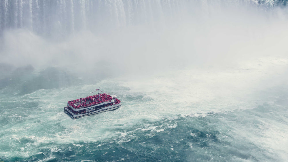 boat near waterfall