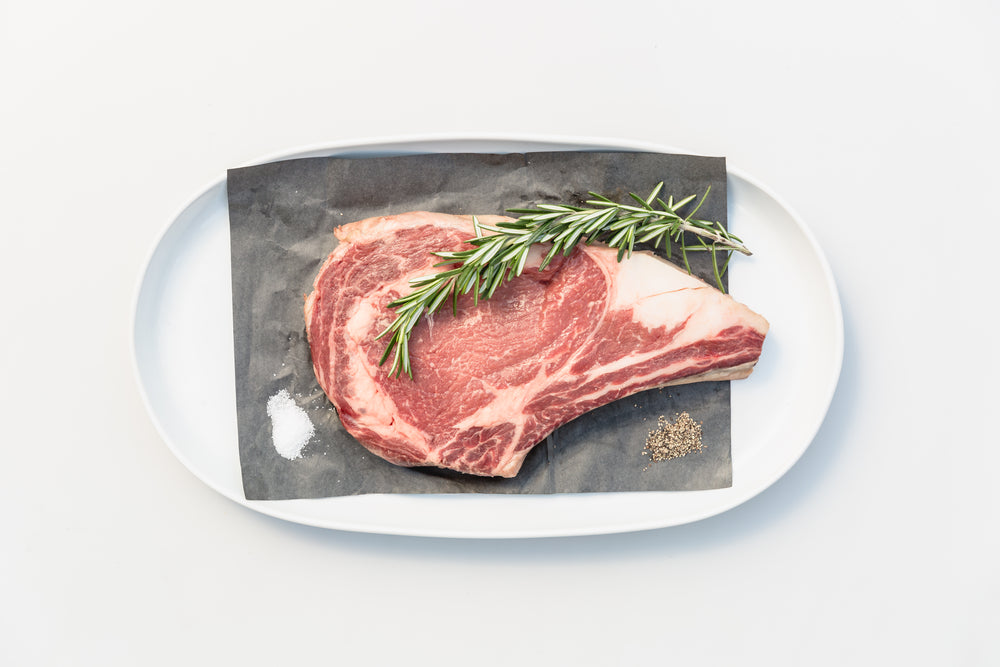 bone in steak with rosemary