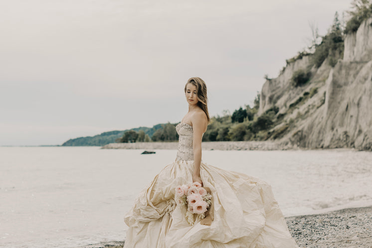 Bouquet Billowing Skirt And Beaded Bodice Wedding Dress