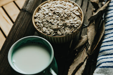 bowl of dry oats and a mug of tea