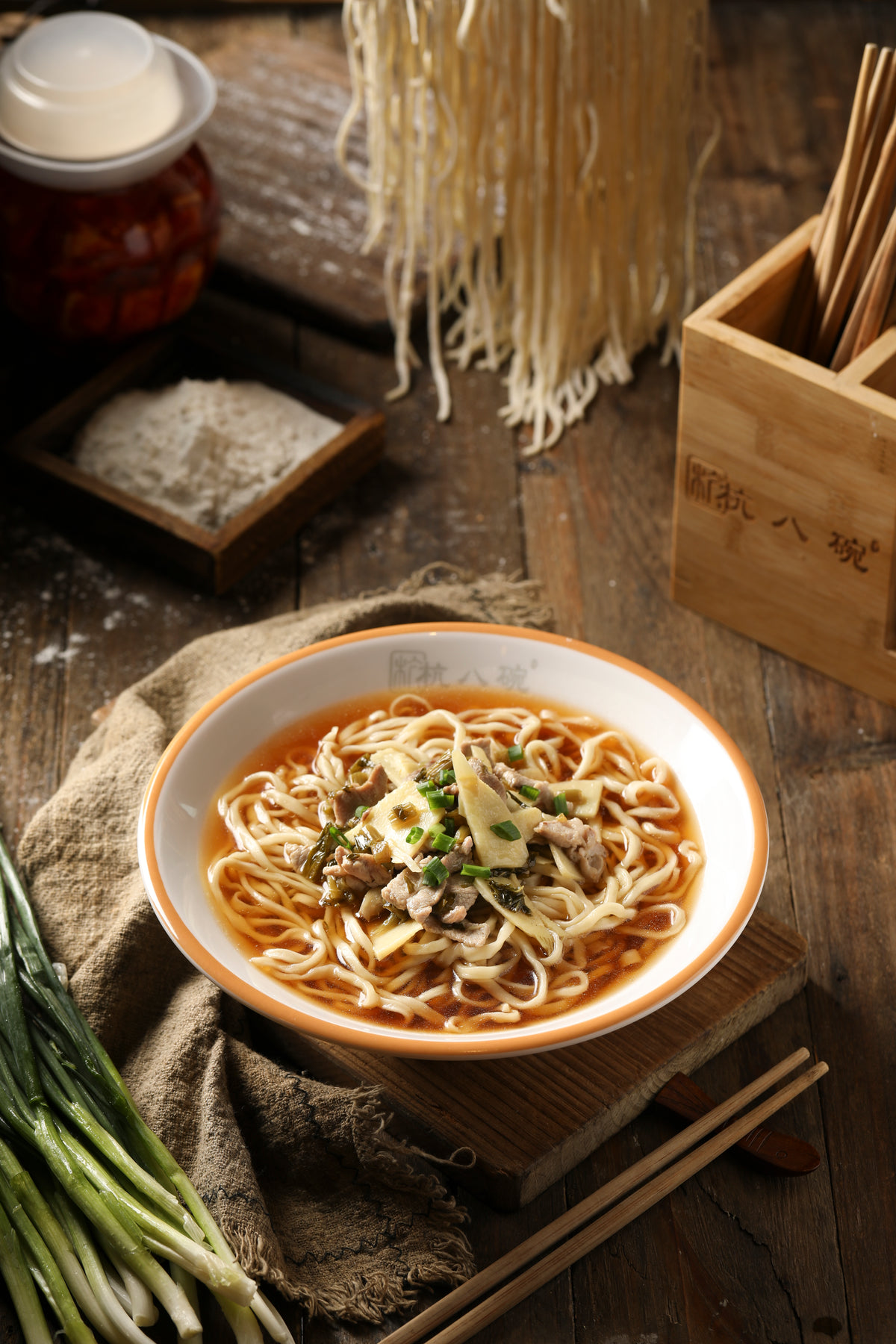 Bowl Of Noodle Soup On Wooden Countertop