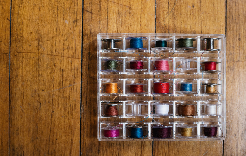 box of colorful thread
