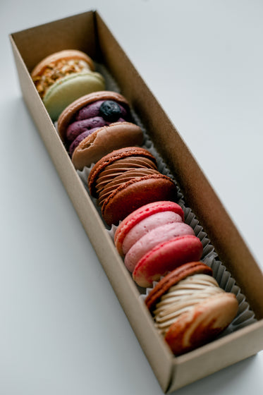 boxed macarons in a line