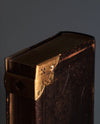 brass corners on leatherbound book