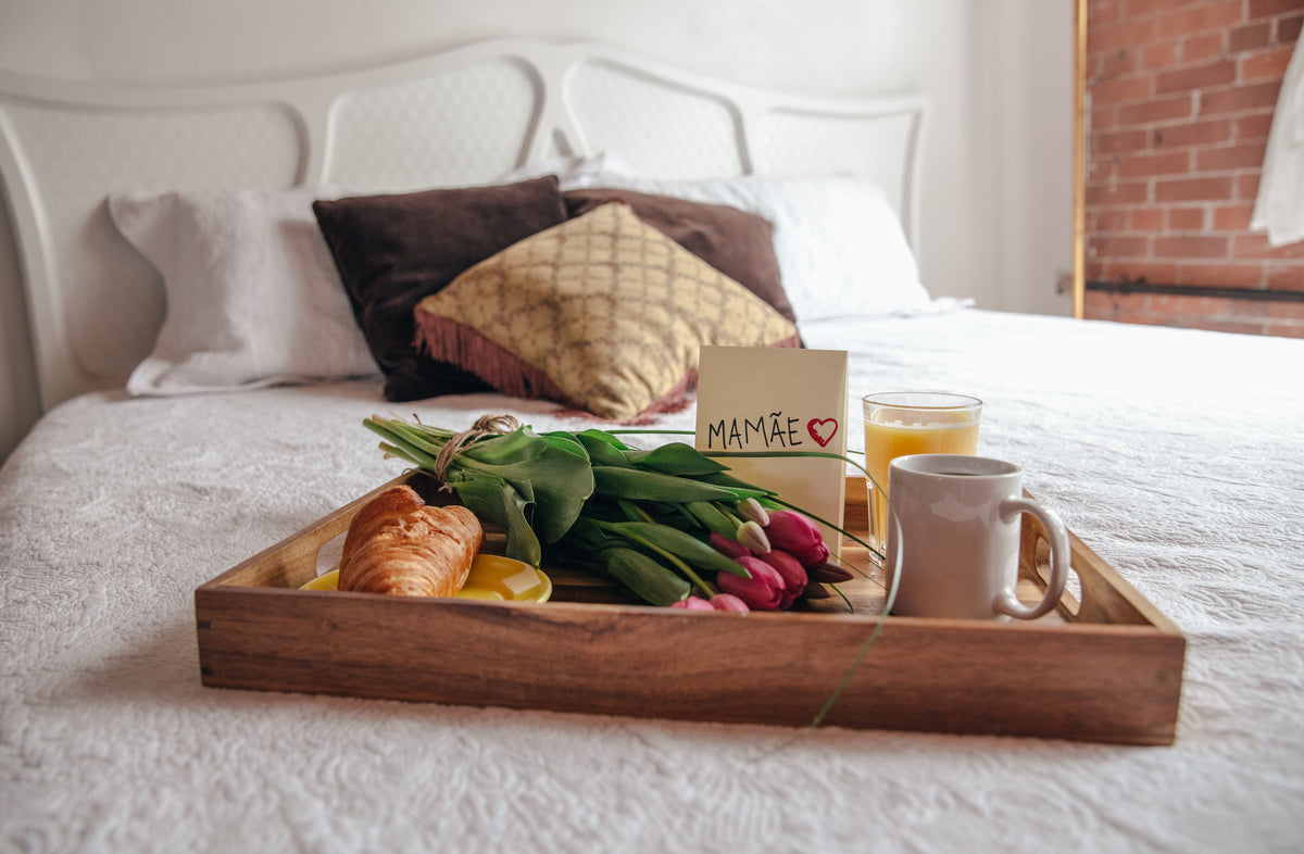 breakfast on bed with flowers for mom