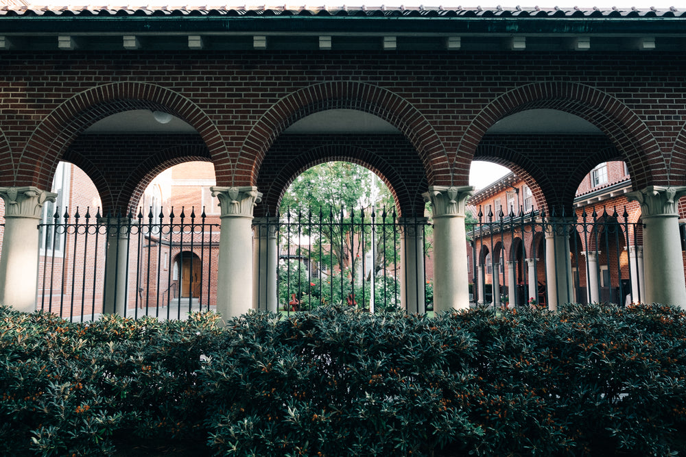 brick archways by garden