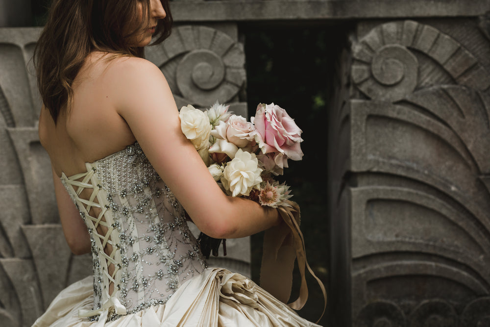 bride bouquet and sculpture wall