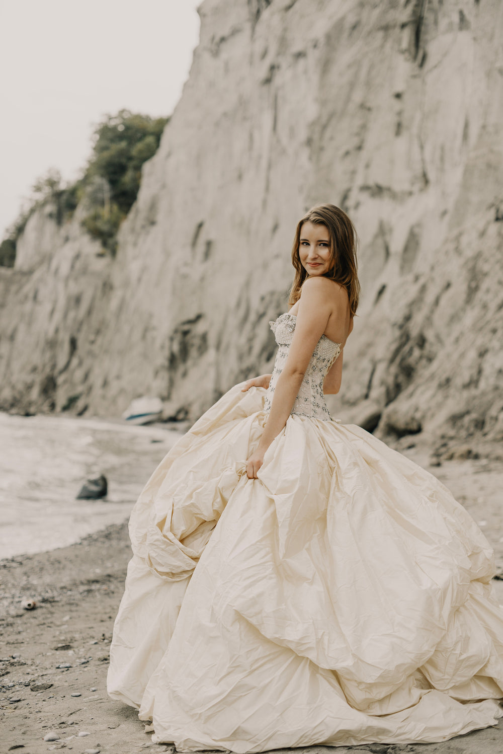 bride in princess gown on the beach