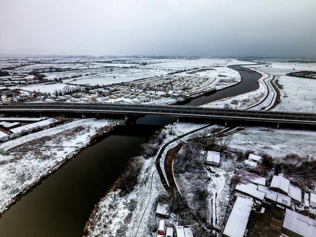bridge over a river in winter