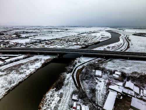 bridge over a river in winter