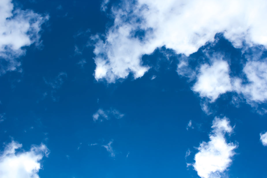 Browse Free HD Images of Bright Blue Sky Dotted With Fluffy White Clouds