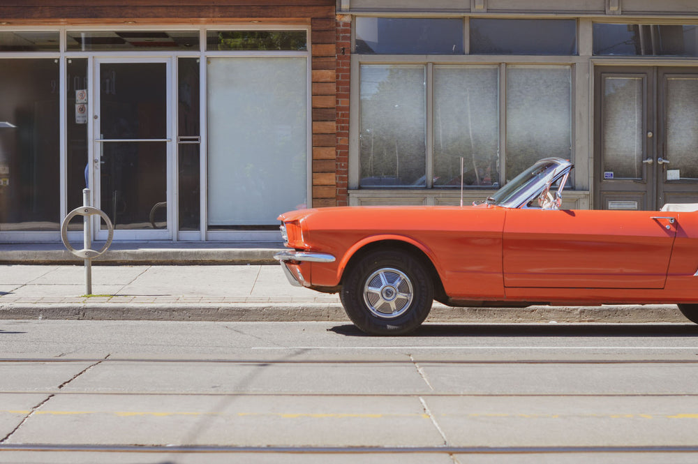 bright classic convertible parked