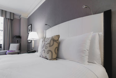 bright hotel room bed