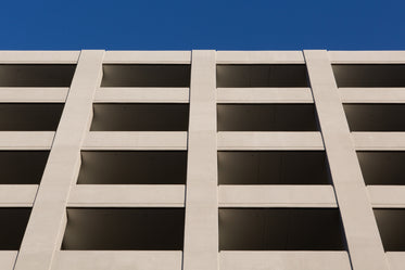 bright parking structure under clear blue sky
