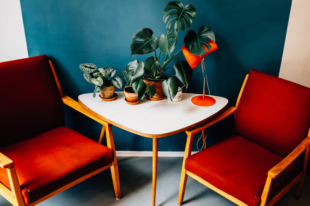 bright red chairs and white table