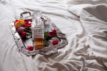 bright romantic bed and drinks