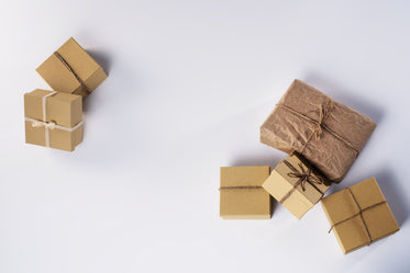 brown boxes tied up in a bow