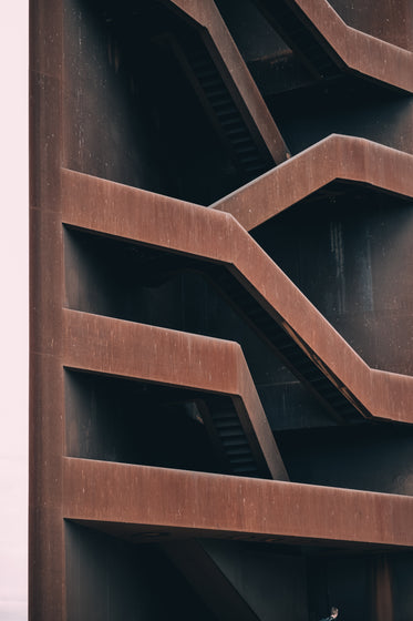 brown building with winding staircases