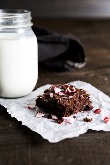 brownie with candy cane and milk