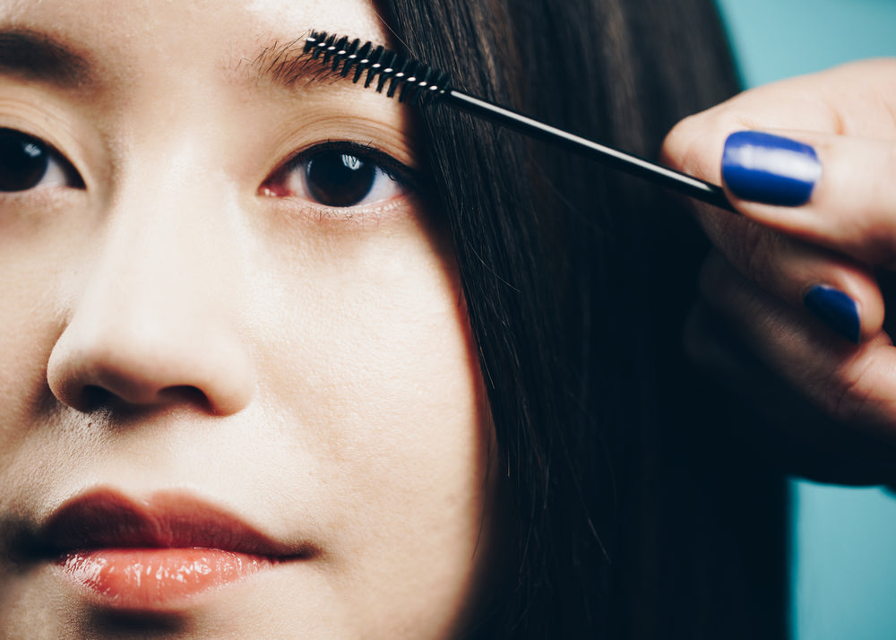 brushing eyebrows