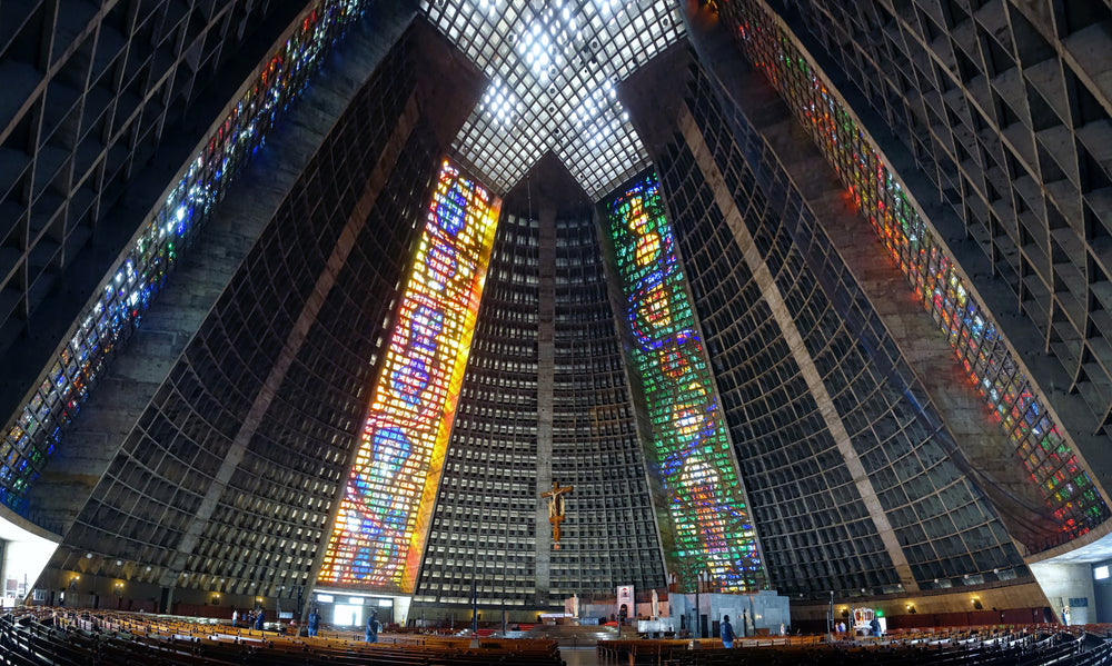 building in tall metal grid and large stained glass