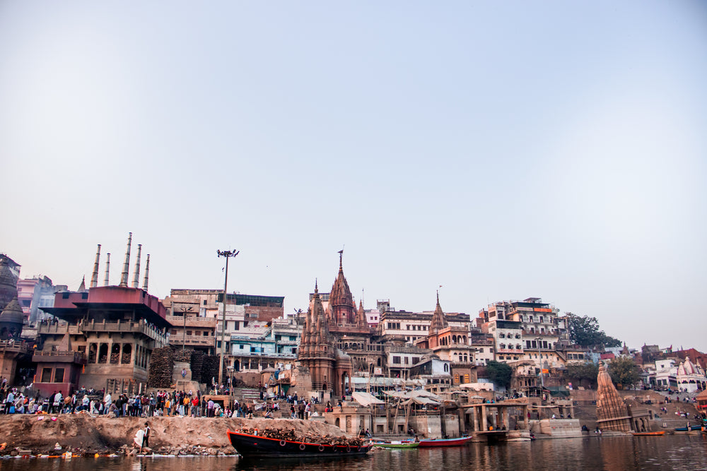 building stacked by the water with boats