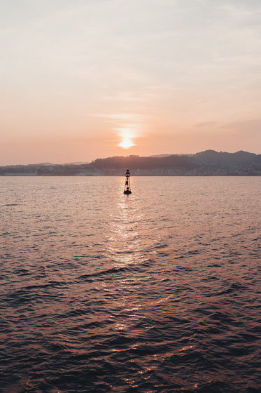 buoy at sunset