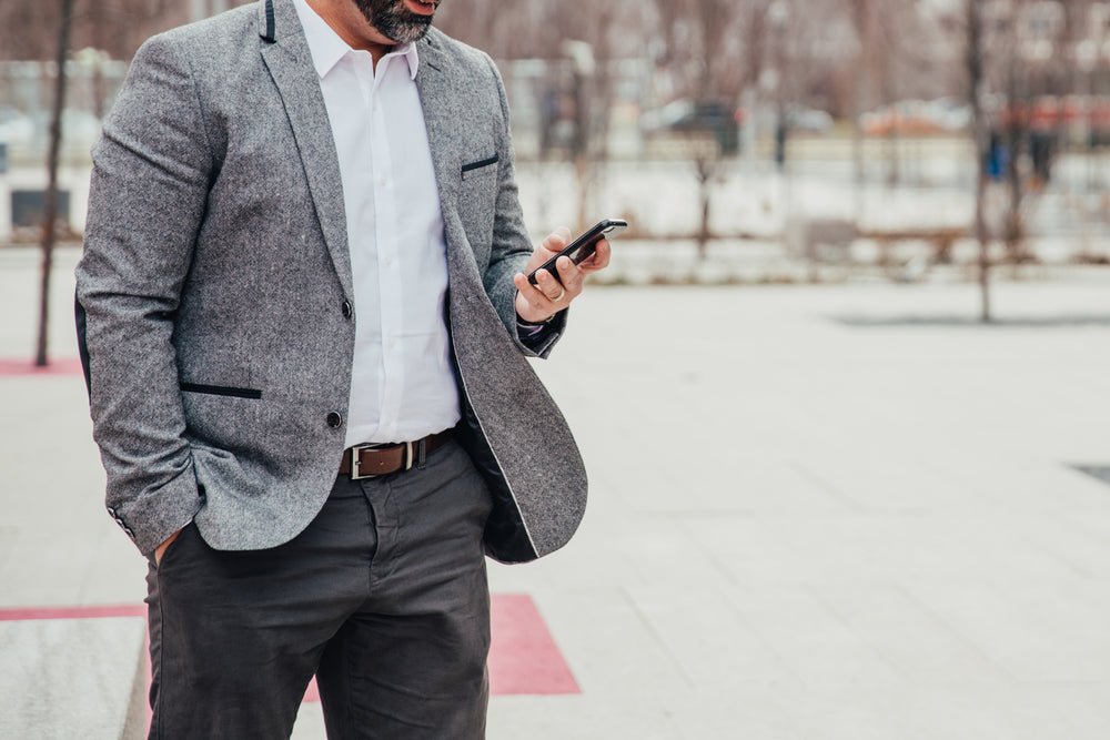 business man checks mobile